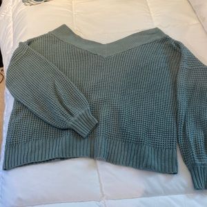 Beautiful oversized sweater with double VNeck.